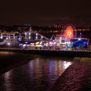 Santa Monica Pier Ferris Wheel and Roller Coaster at Night